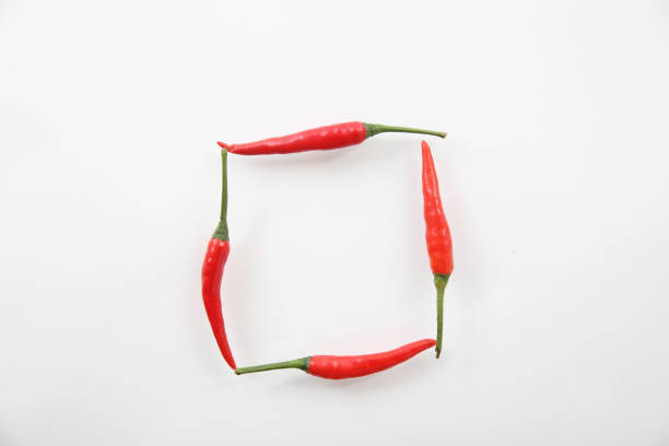 istock chili pepper with space square for text isolated on a white background 837299312