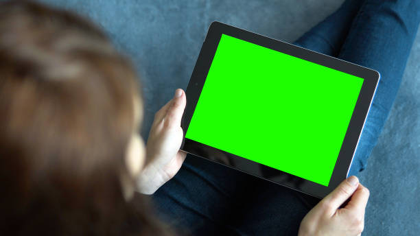 istock Girl Holding Tablet PC on Blue 837300470