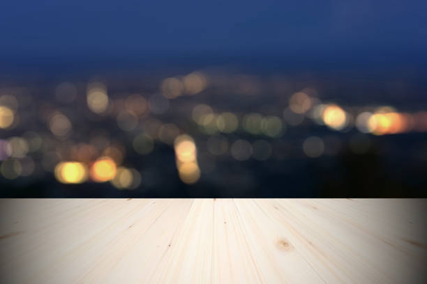istock Empty wooden table in perspective and bokeh 837301108