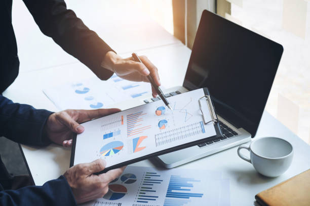 istock Young businessteam working with new startup project. discussing the charts and graphs showing the results at meeting. Business accounting and financial concept 837305162