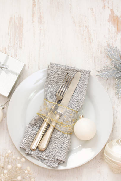 istock Christmas dinner decoration on white wooden background 837318032