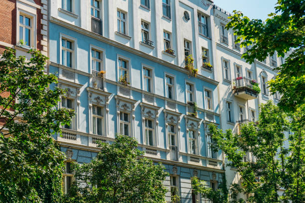 istock beautiful houses in a row framed by trees 837322176