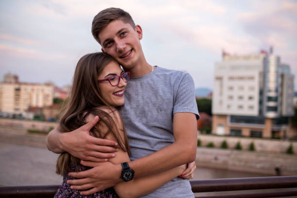 istock Young cute couple hugging in love 837335740