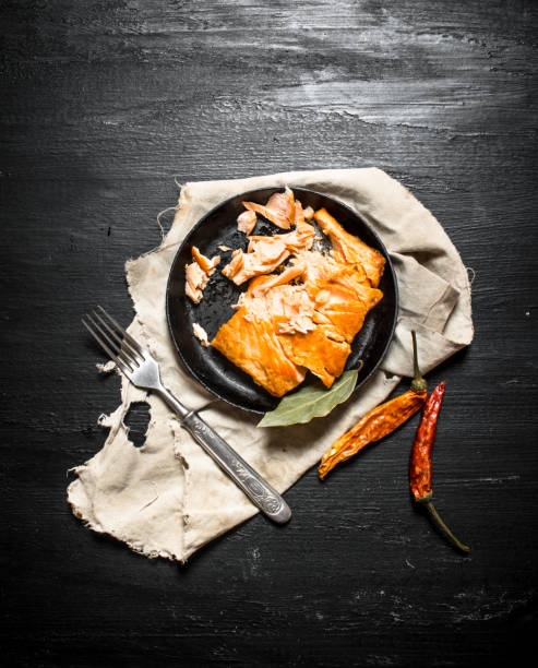 istock Fried salmon with spices in a bowl. 837336312