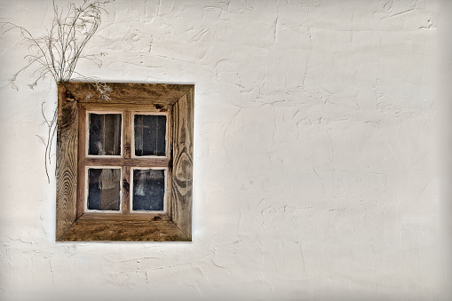 background ancient Ukrainian hut wall with window closeup