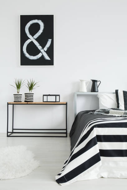 istock cozy black and white bedroom 837344802