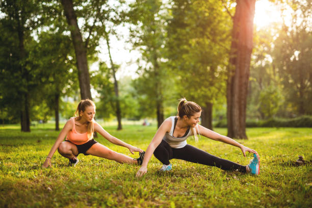 fitness in the park - healthy lifestyle nature sports shoe childhood imagens e fotografias de stock