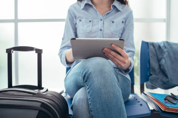 istock Woman connecting in the waiting room 837352192