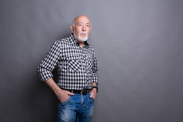 istock Serious senior man posing with hands on hips 837358854