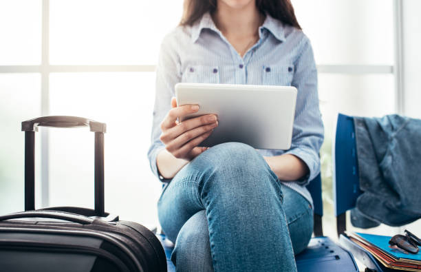 istock Woman connecting in the waiting room 837359506