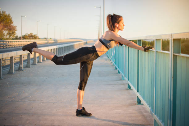istock Fitness girl doing stretching exercises on the bridge. 837364840