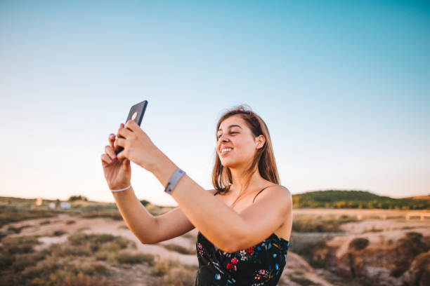 istock Young woman taking a picture 837369332