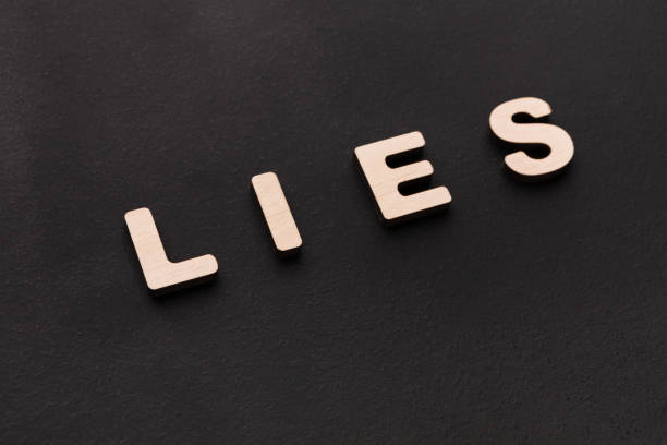 istock Word Lies on black background 837369404