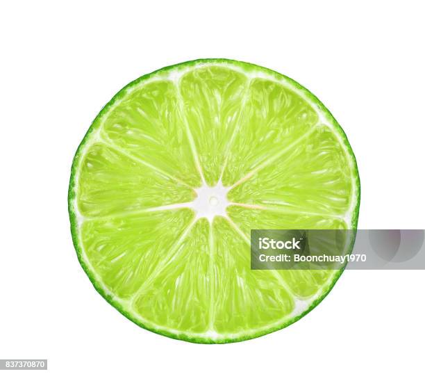 Half Of Fresh Lime Isolated On White Background Stock Photo - Download Image Now - Lime, Close-up, Slice of Food