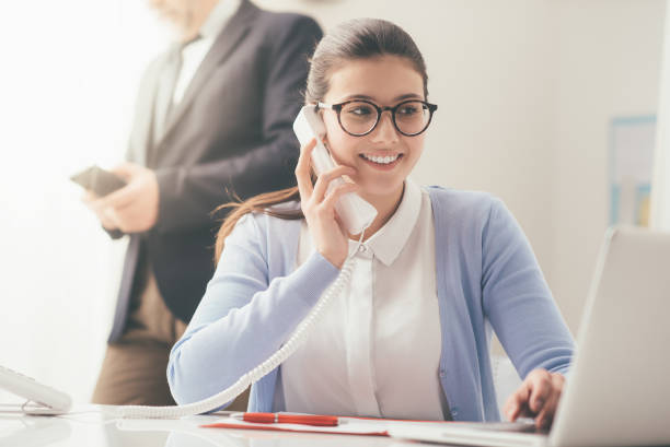 istock Efficient secretary on the phone 837377062