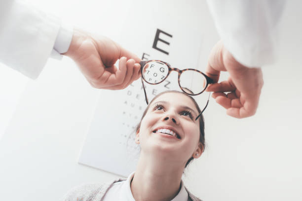 istock Happy woman trying her new glasses 837377440