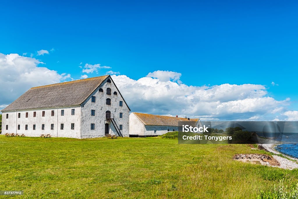 Smygehuk Swedish Coastline Smygehuk is a harbour and fishing village at Smygehamn in Sweden is known for being the southernmost point of Sweden, and the entire Scandinavian Peninsula. Beach Stock Photo