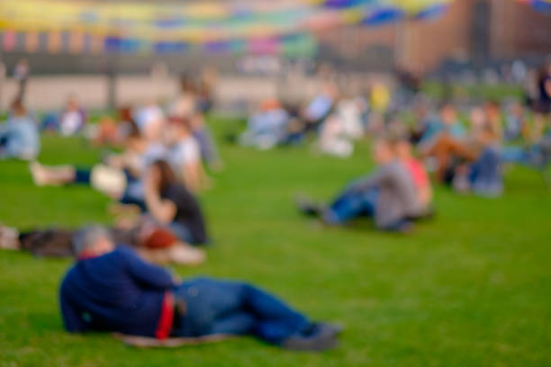 istock abstract blurry background with people in a park 837385234