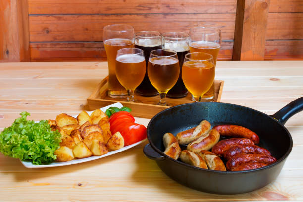 istock Beer, roasted potato and grilled sausages. Selective focus 837385670