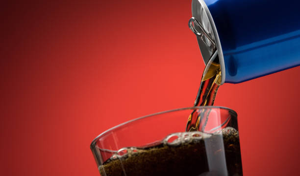 istock Pouring a soft drink in a glass 837385912