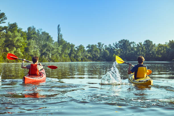 istock A canoe trip along the river along the forest in summer. 837408210