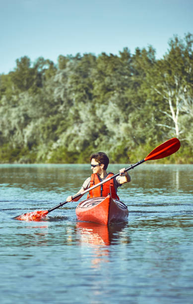 istock A canoe trip along the river along the forest in summer. 837408244