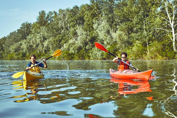 istock A canoe trip along the river along the forest in summer. 837408304