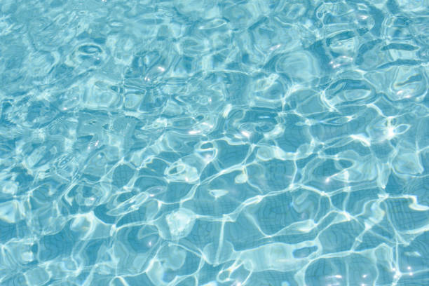 istock Ripple Water in swimming pool witn sun reflection 837417190