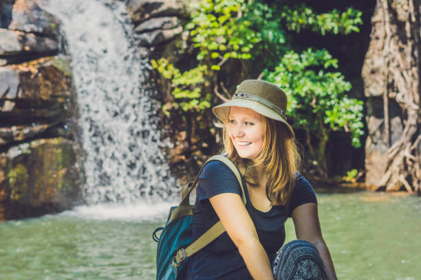istock Smooth rocks and pond on a tropical forest background 837430388