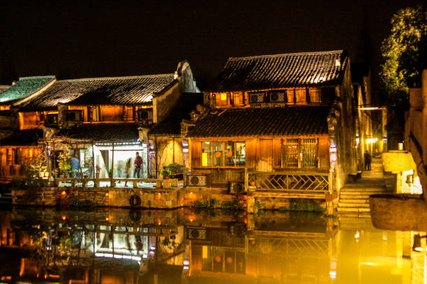 istock Old wood chinese city by night 837431858