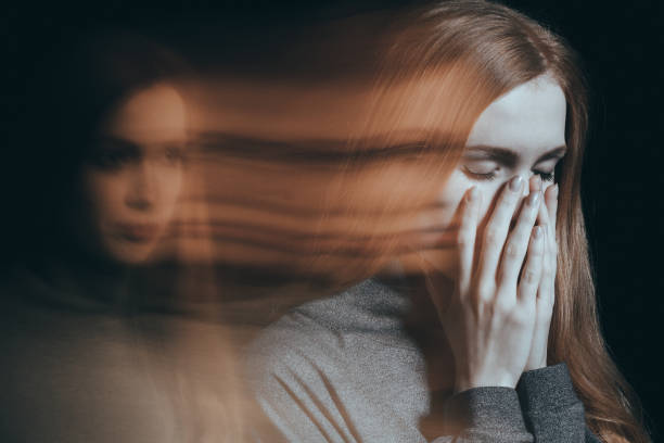 Woman with emotional problems Young woman with emotional problems covering her face, crying Phobia stock pictures, royalty-free photos & images