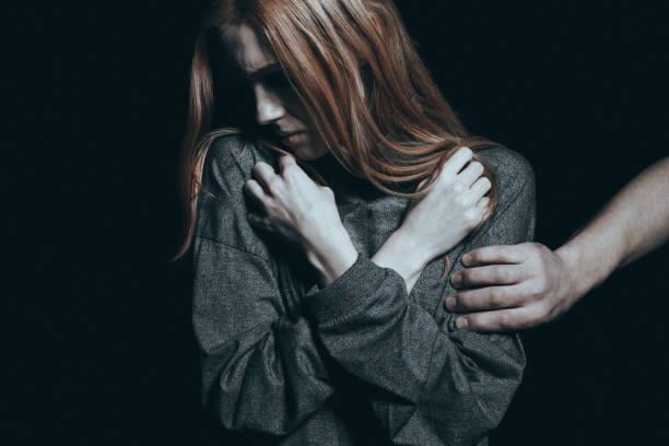 fearful rape victim - mental illness depression women schizophrenia imagens e fotografias de stock