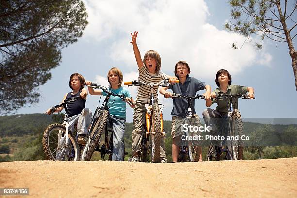 Boys On Bicycles Stock Photo - Download Image Now - Cycling, Bicycle, Group Of People