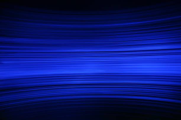istock blue neon fibre optic flowing light trail 837445492