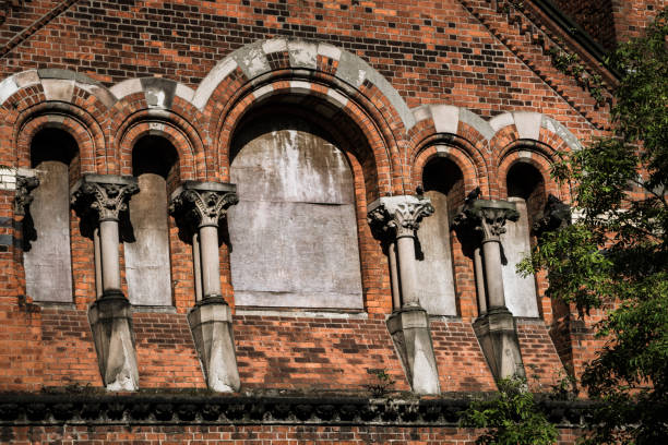 Abandoned church, boarded up, in an inner city neighbourhood in Belfast, Northern Ireland.  The former Methodist church was built in 1865 and designed by W J Barre.
