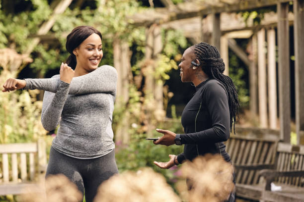 istock Female friends after training session at park 837454092