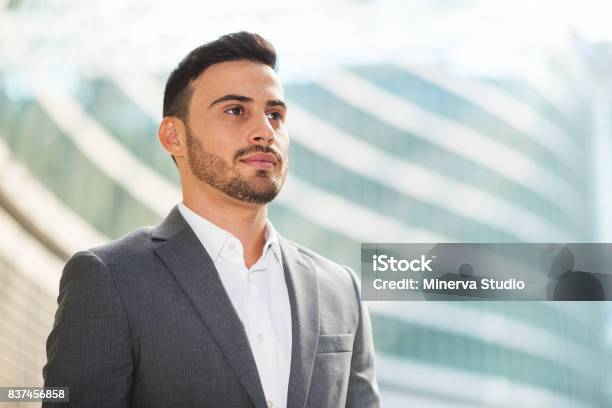 Headshot Portrait Of Smiling Ethnic Businessman In Office Stock Photo -  Download Image Now - iStock