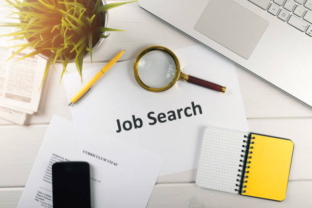 job search items on white table. top view