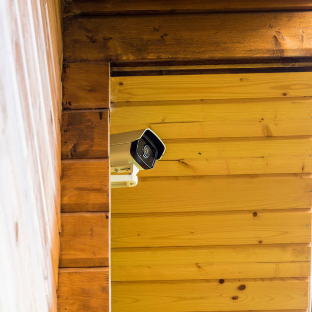 istock hidden surveillance camera on the front of the house. 837492618
