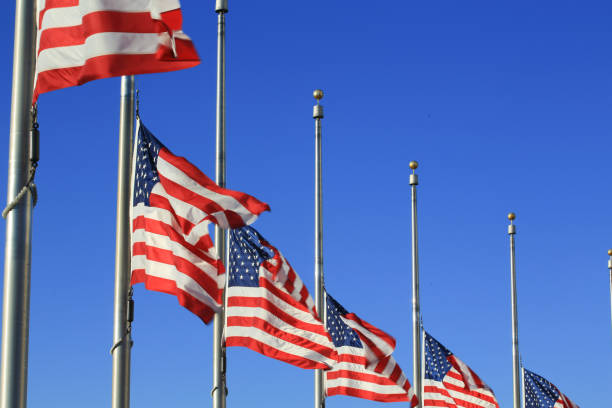 istock US FLAG with the blue sky 837502588