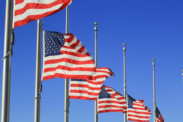 istock US FLAG with the blue sky 837504988
