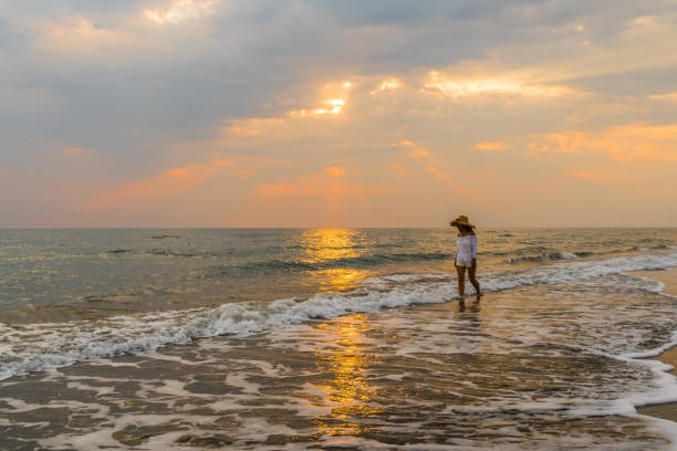 istock Woman is running to the sea 837507204