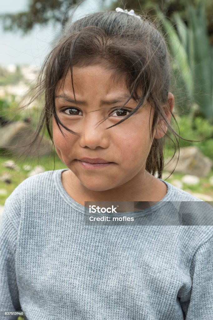 Latin expressive little girl Profound glance of a very young harvesting girl Child Stock Photo