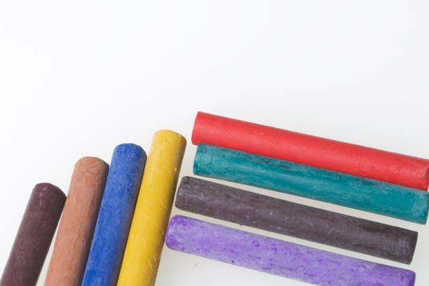 istock Crayons pastels in different colors. Lying in a box in their places. On a white background. Diagonally across the frame. 837514836