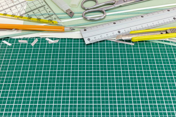 istock green cutting mat with metal ruler, yellow cutter, pencil and scissors 837518764