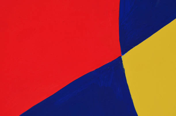 Red. yellow and blue. Round shaped colored magnets, on white background, placed as colored strips