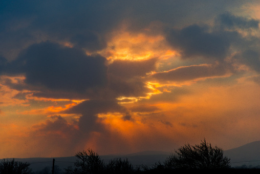 Sunset and clouds at the evening