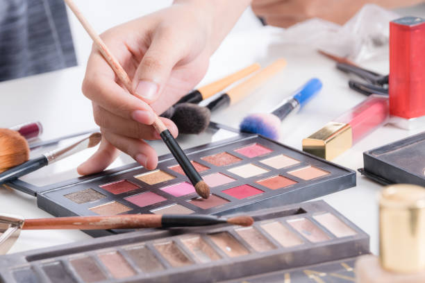 istock Makeup artist hand using brushes powder foundation and tools of make up artist accessory 837529124