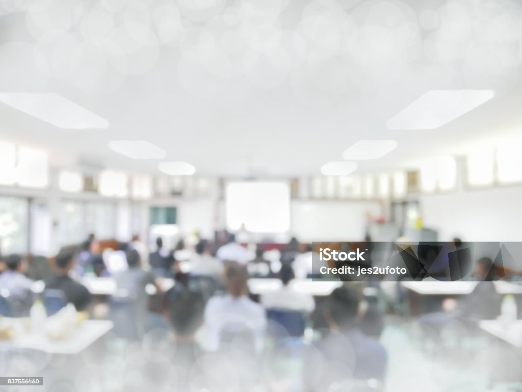 blurred people lecture in seminar room education or meetting concept ,abstract blur people background blurred people lecture in seminar room education or meetting concept :abstract blur people background Blurred Motion Stock Photo