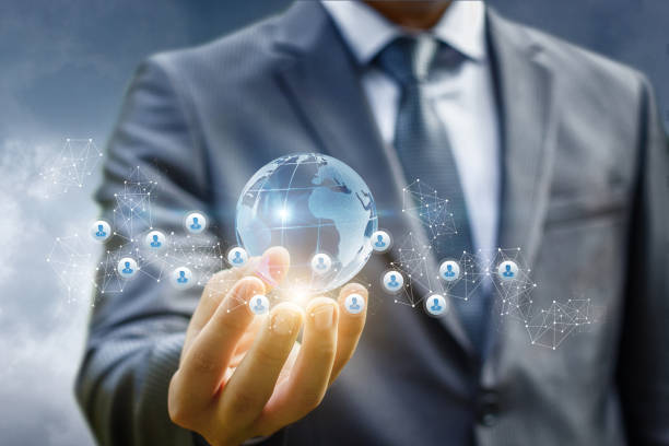 istock Businessman holds in hand a global business network. 837556512